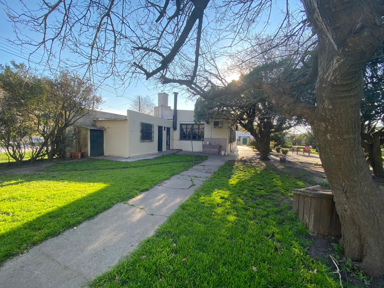 Venta- Manzana con vivienda y local comercial.
